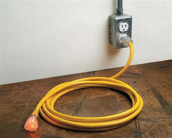 Can I plug my RV into my house with an extension cord?