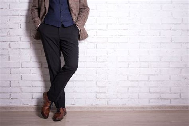 Can you wear black boots with brown pants?