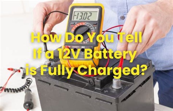 How can you tell if a car battery is fully charged?