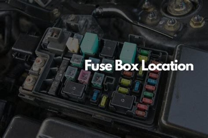 How do you open the fuse box on a steering wheel?
