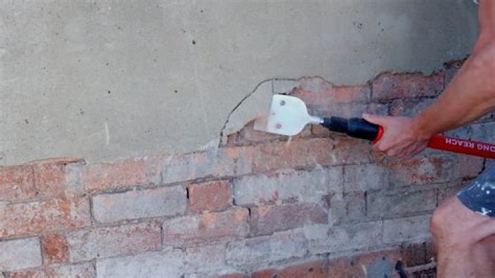 How do you remove faux bricks from plaster walls