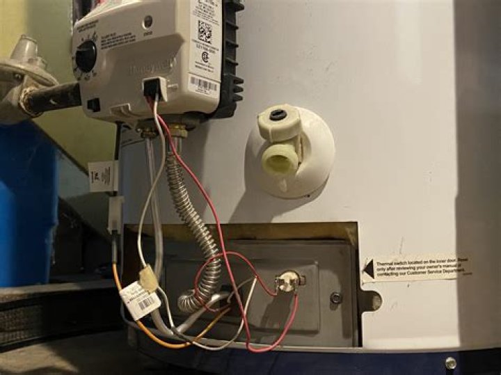 How do you reset the thermal switch on a American water heater?