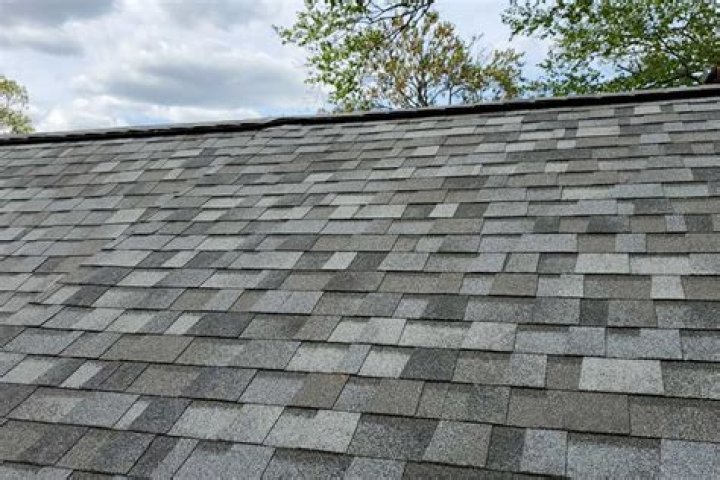 How much does it cost to paint a shingle roof