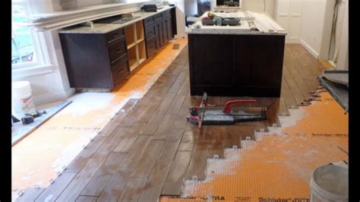 Should a floating floor be installed under cabinets