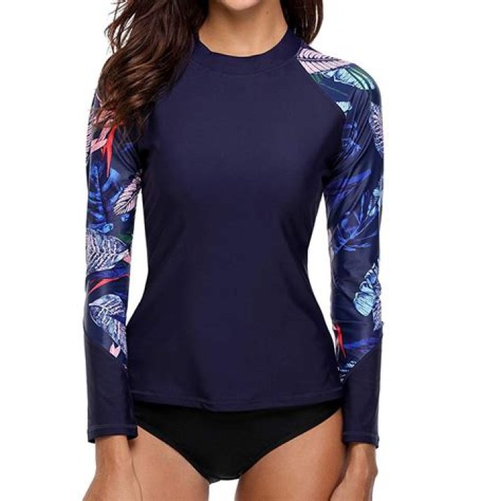 What does a woman wear under a rashguard