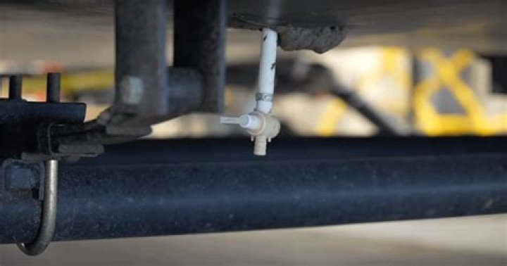 What is the purpose of a low point drain on an RV?