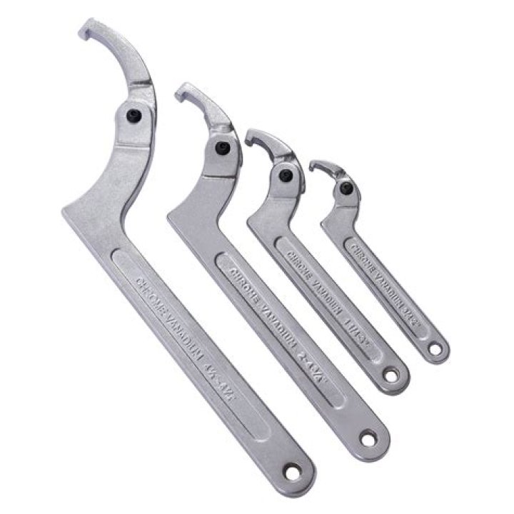 What kind of wrench should be used to tighten engine components such as manifolds and cylinder heads