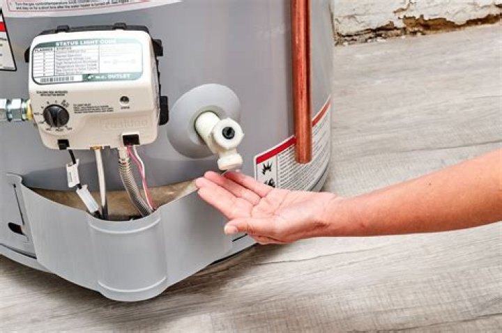 When does a water heater stop heating water?