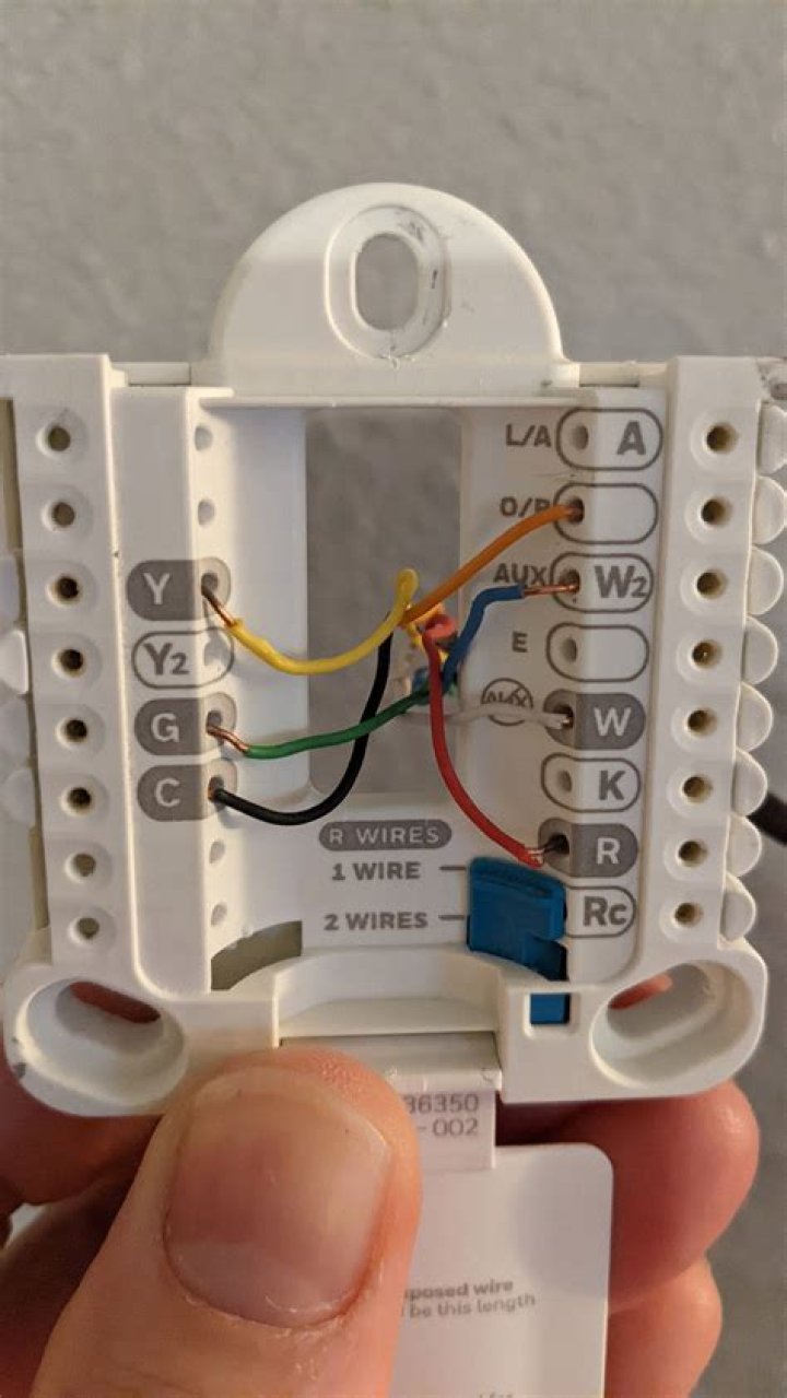 Where does red wire go on thermostat?